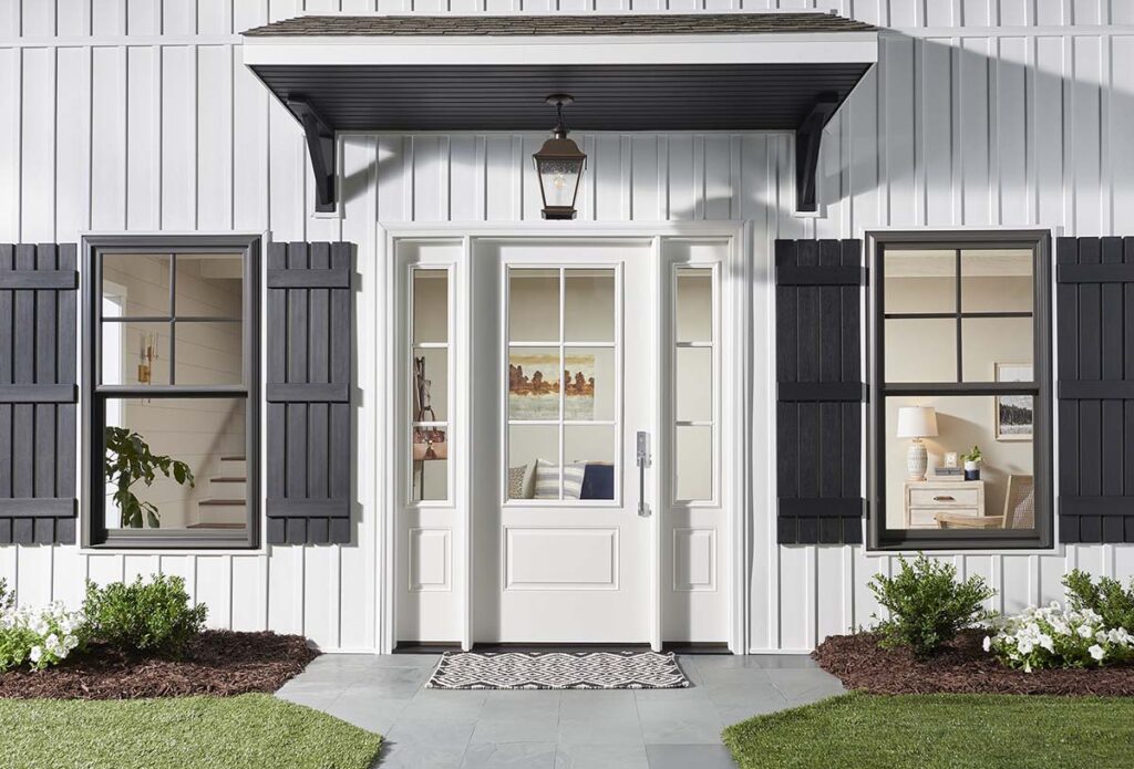 modern front entry way with white front door